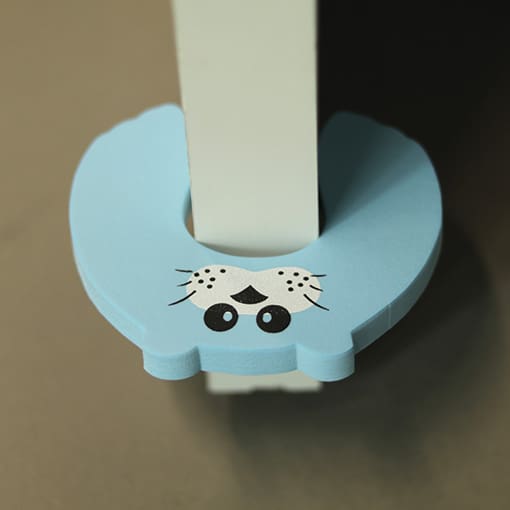 Sæl dørstopper i brug 2